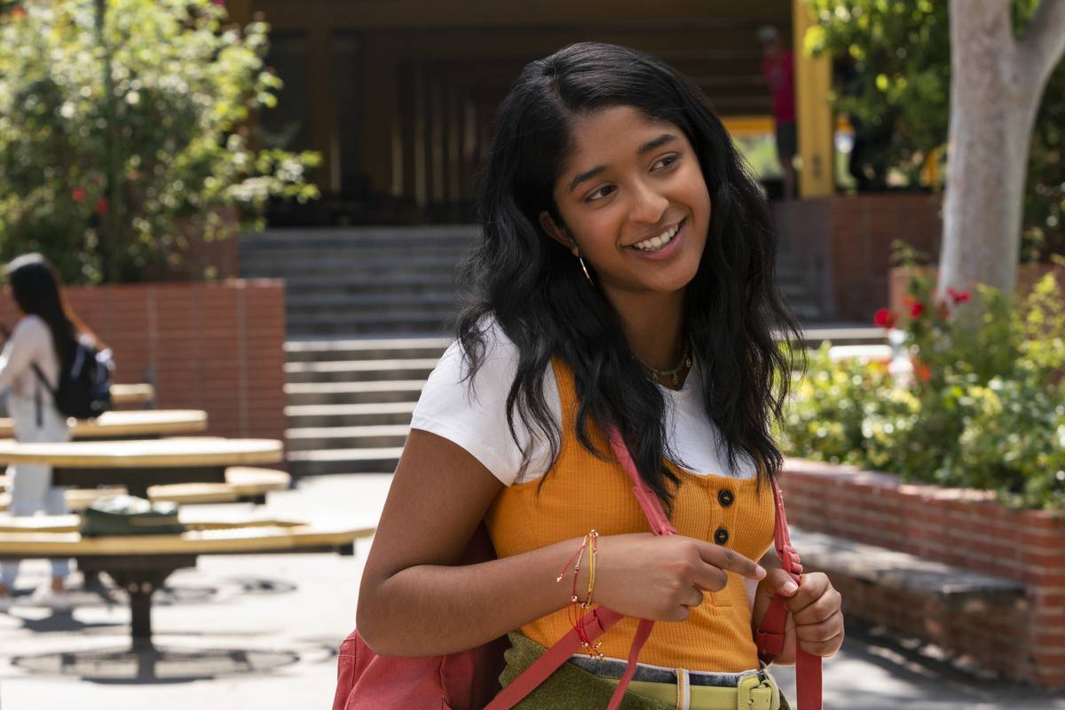 a young female actress wearing a backpack in never have i ever