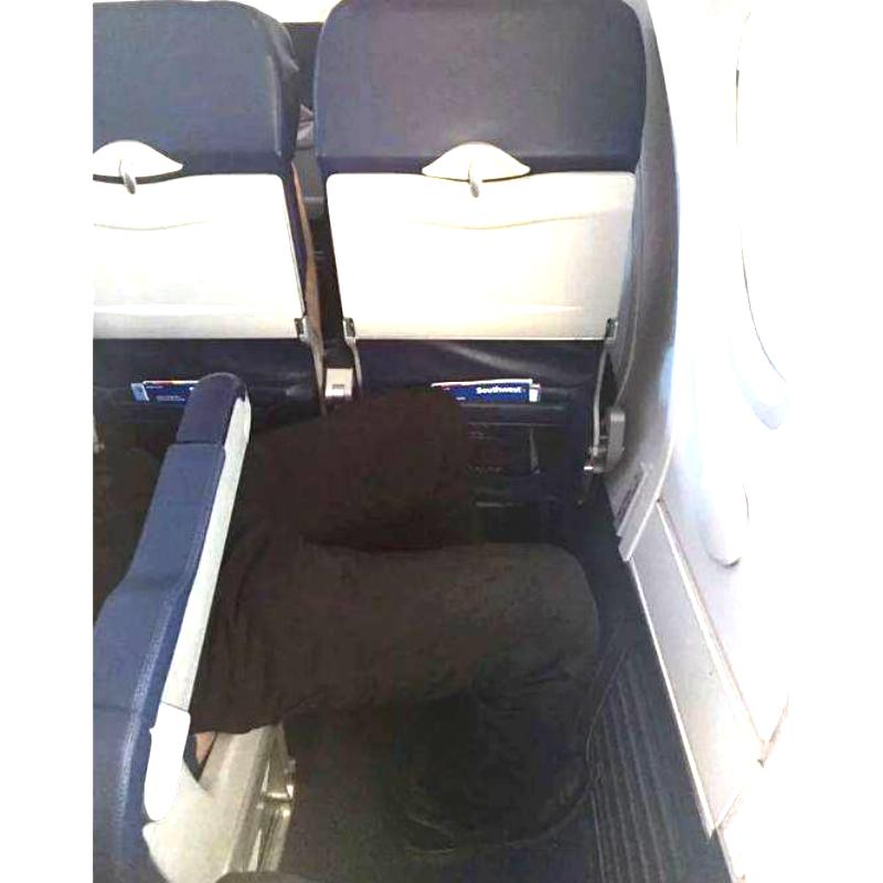 GogglesPisano Reddit person sitting sideways on a plane