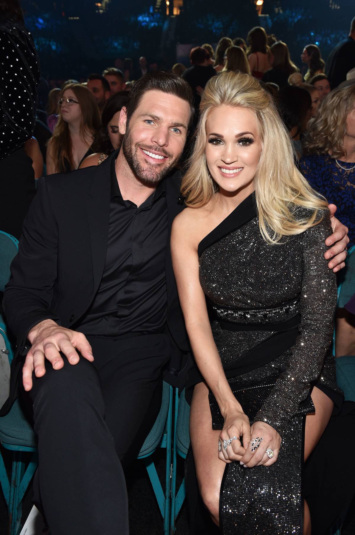 Mike Fisher and Carrie Underwood attend the 54th Academy Of Country Music Awards.