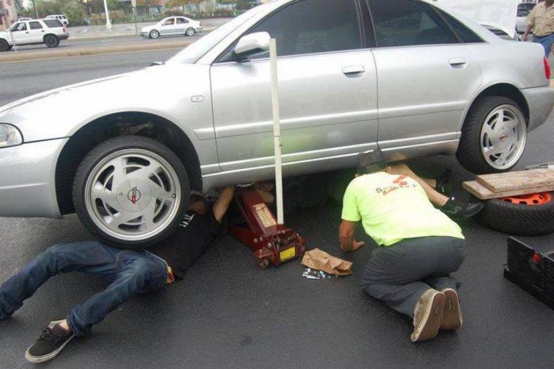 death becomes me with the car Improperly jacked car with a person working underneath it