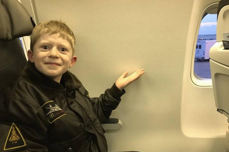 kid pointing to lack of window kid pointing to lack of window with a grimace