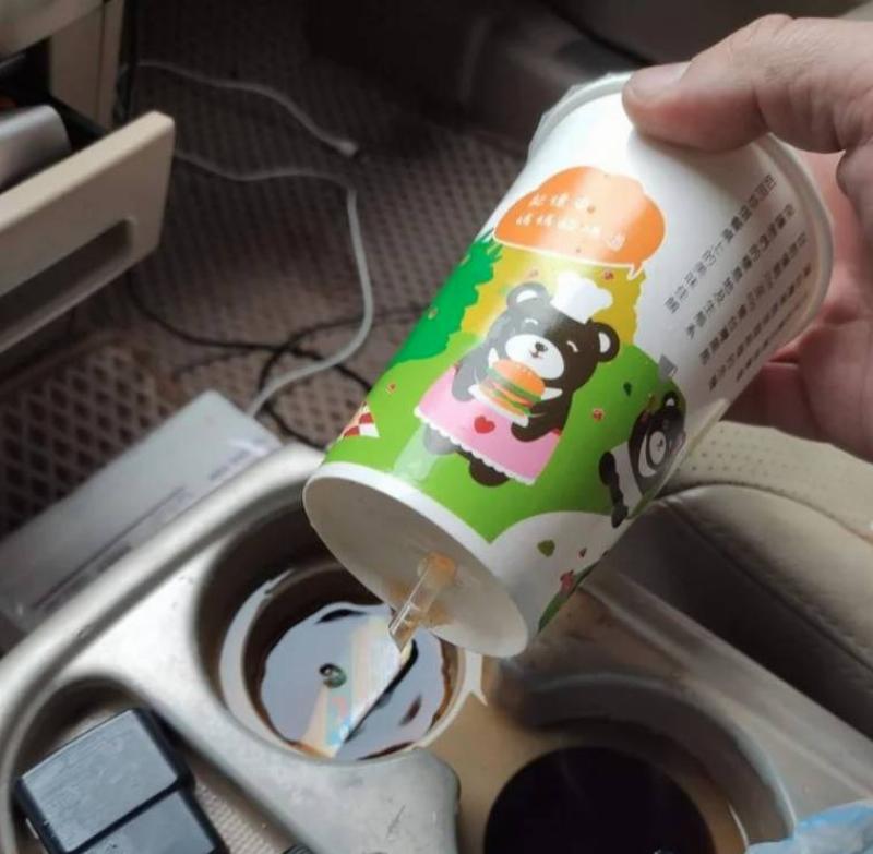 straw in takeaway cup pierced the bottom of it so it leaked into car cupholder