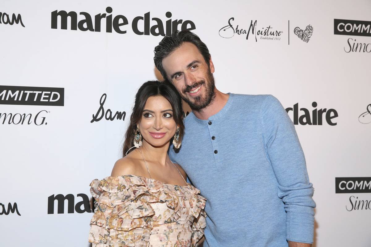 Ryan and Noureen pose together at a Marie Claire event.