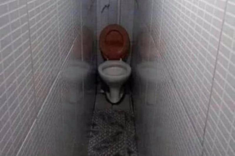 tight hallway leading to toilet