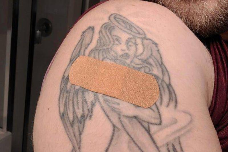 Z-man9 REddit band-aid over tattoo