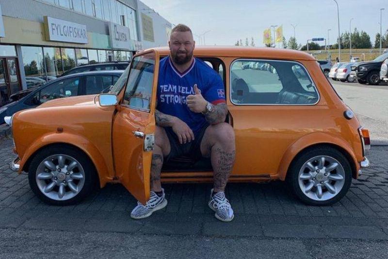 big man on campus in car