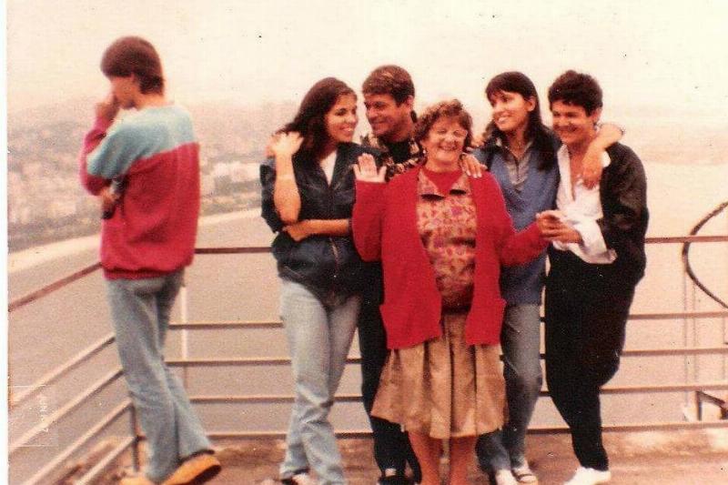 family photo on bridge family photo on bridge beside man