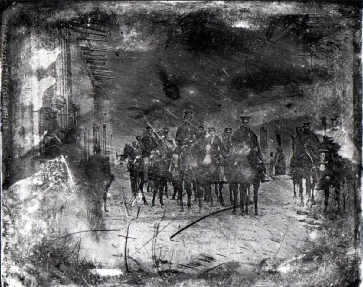 The first war photos show American soldiers on horseback.