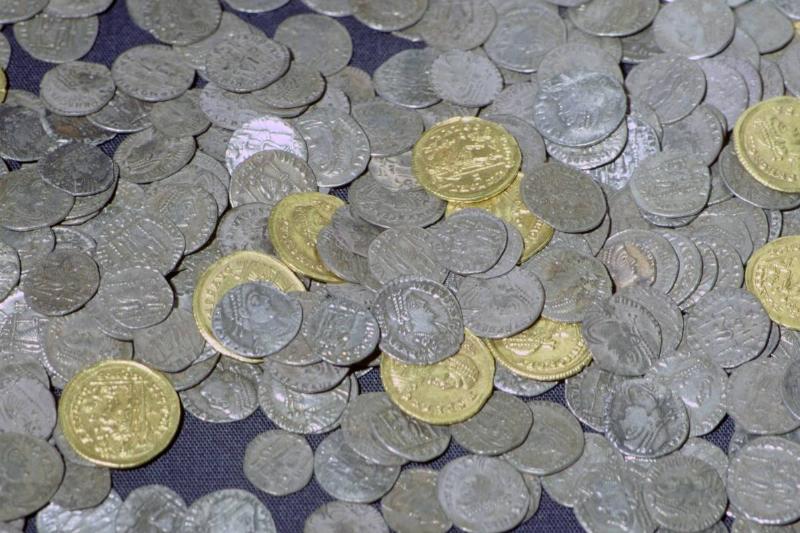 Roman coins from the Hoxne Hoard are on display.