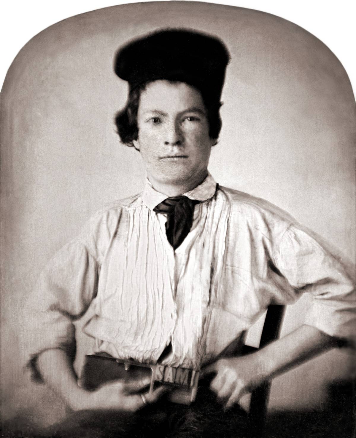 A portrait shows Samuel Clemens at age 15.