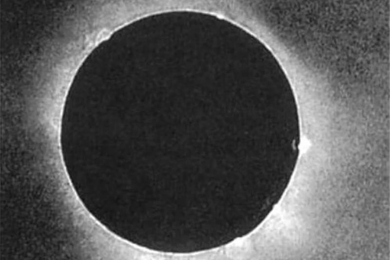 The first photo of a solar eclipse is in black and white. 