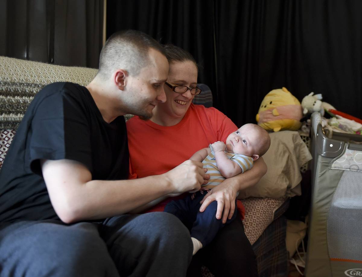 parents with newborn