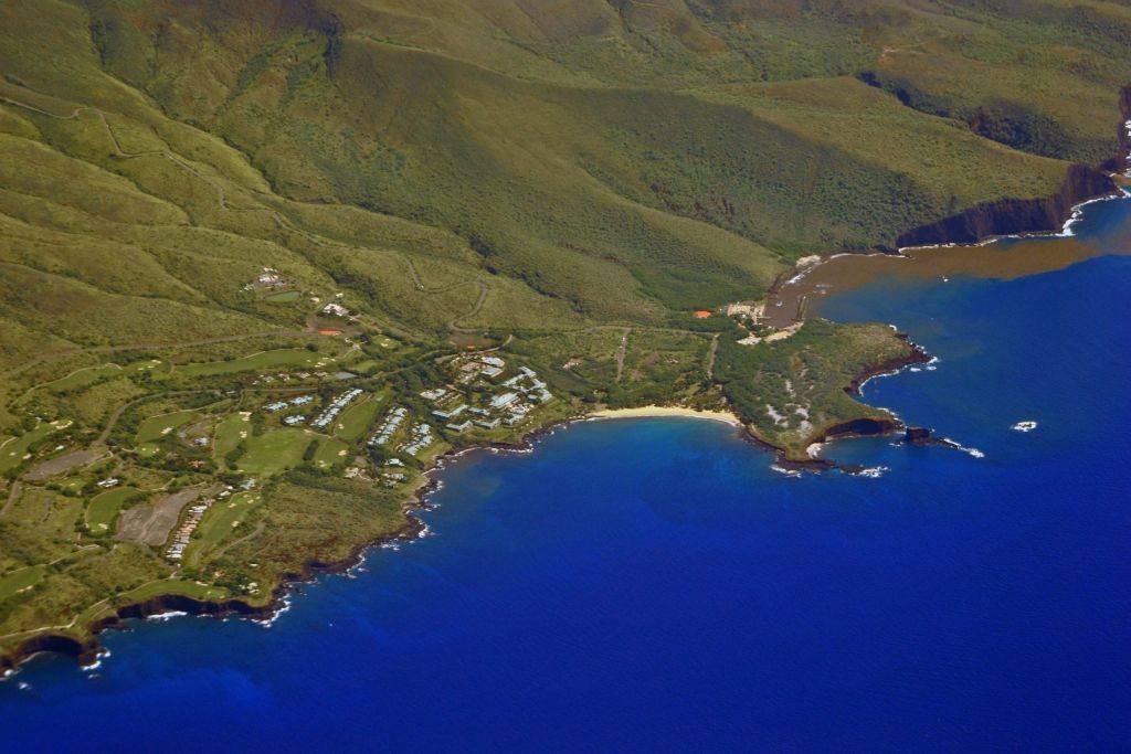 Aerial view of Hulopoe Beach and Puu Pehe or Sweetheart Rock. Lanai Island. Hawaii. USA