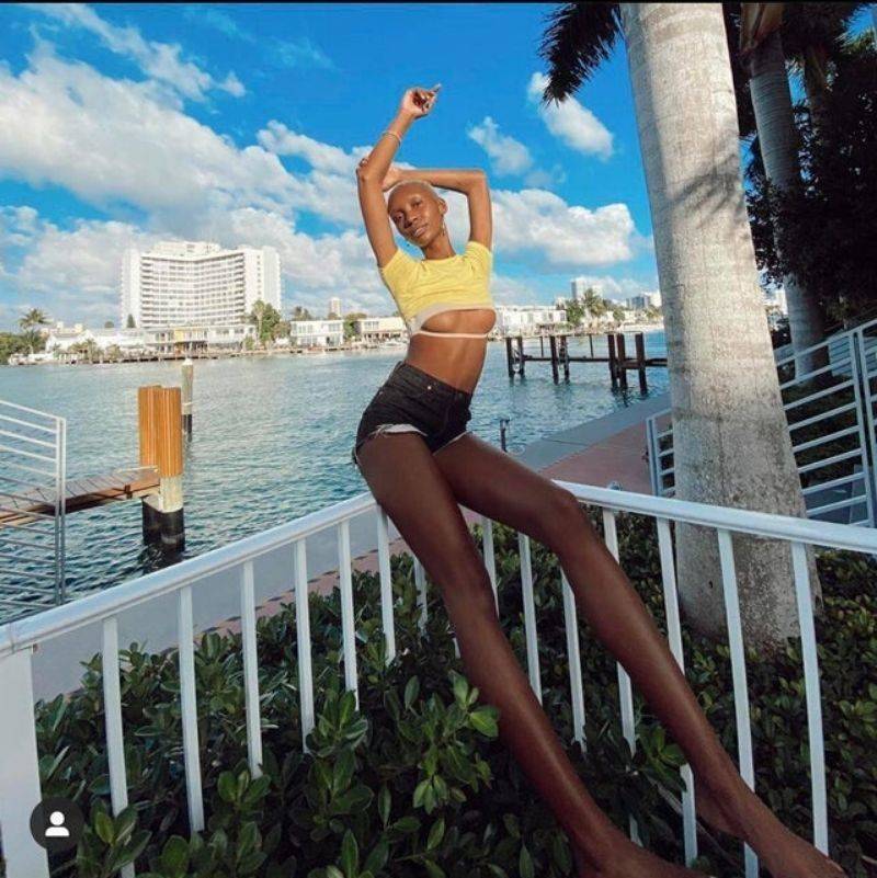 woman photoshpped extremely long legs