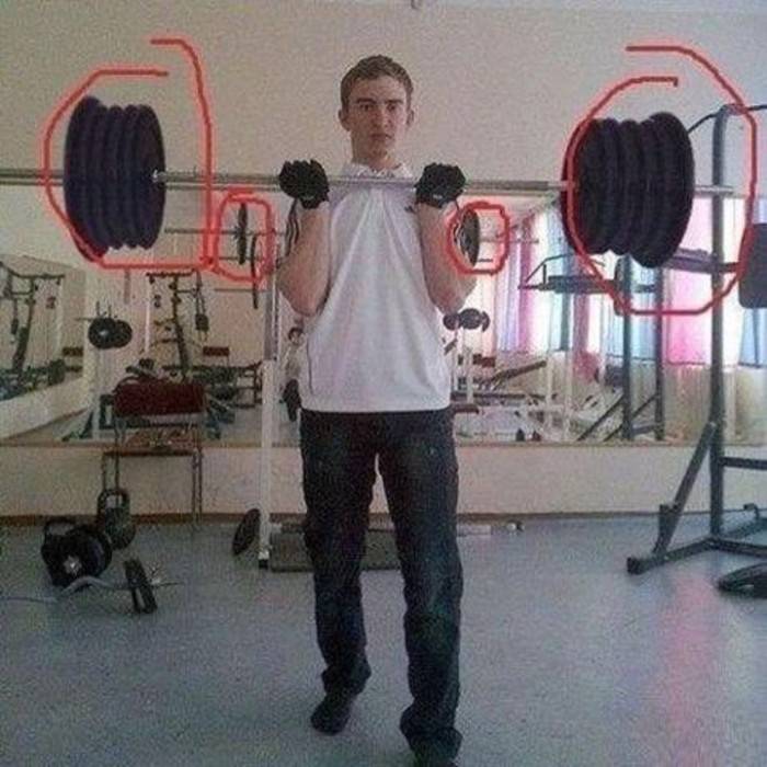 boy photoshopped weights onto bar but mirror shows real weight