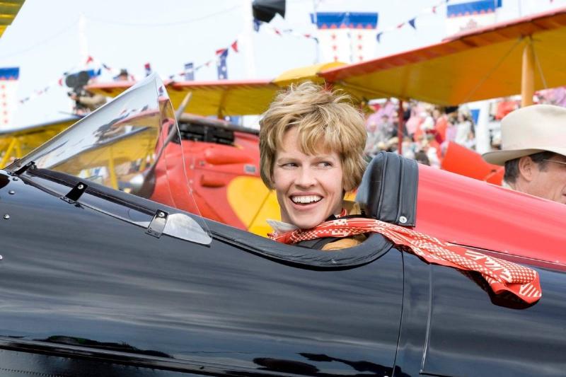 Hilary Swank, portraying Amerlia Earhart, sits in a plane during the 2009 movie.