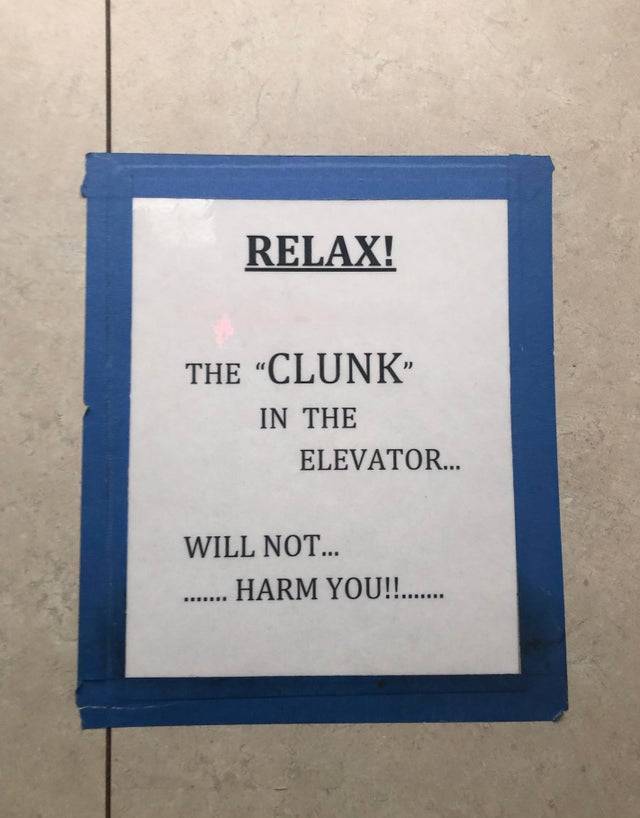 sign on wall: Relax! The 