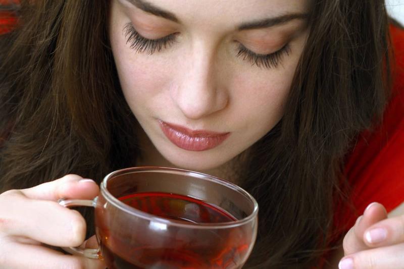 njm-drinking WOMAN DRINKING AN HERBAL TEA