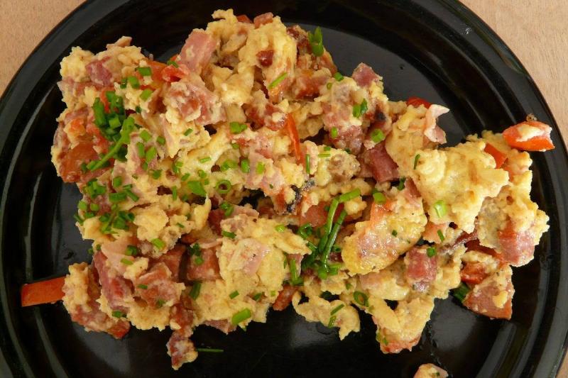 tqh-eggs scrambled eggs on a plate