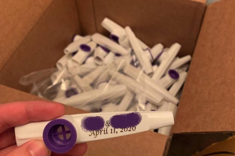 kazoos with printed wedding date, but hardware on instrument blocks the date