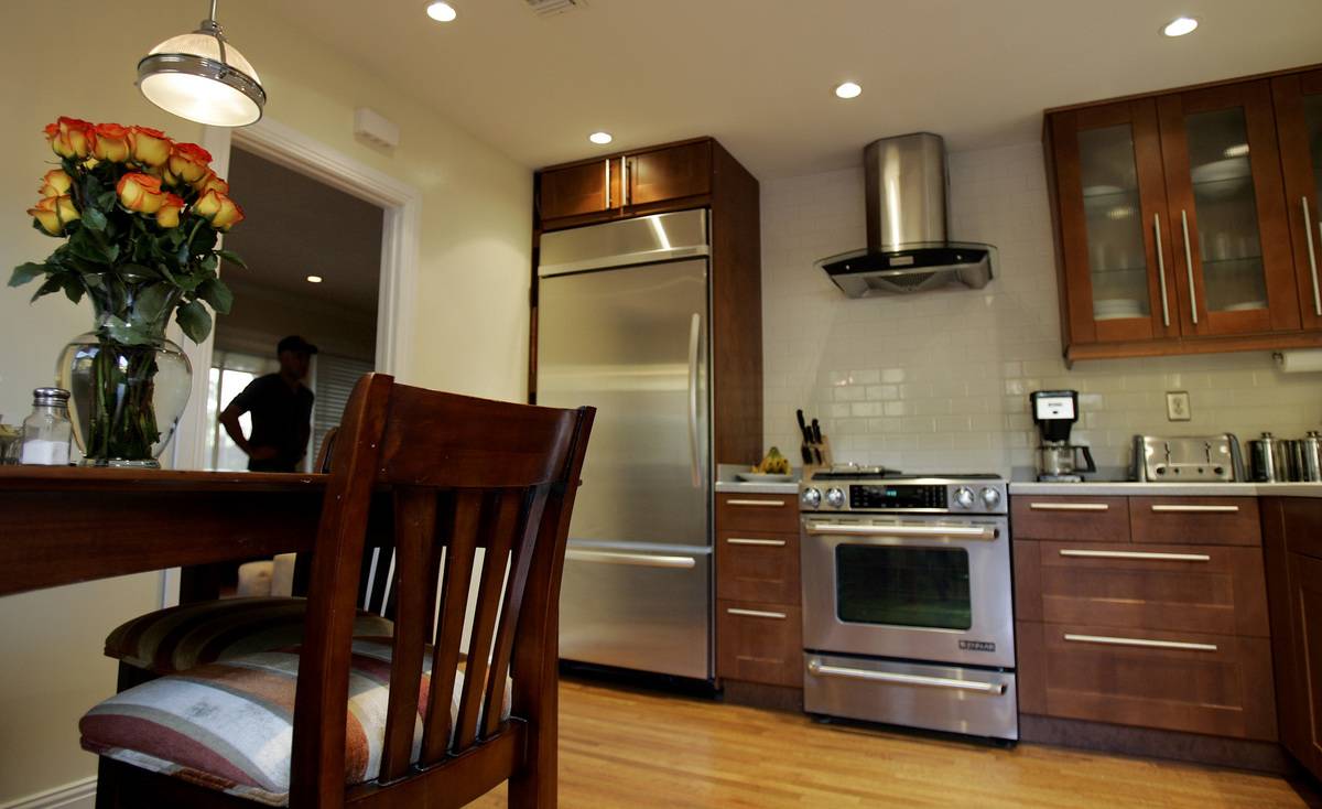 Alan Hopkins and his partner David McCoy kept the kitchens orginal footprint when remodeling_ addin