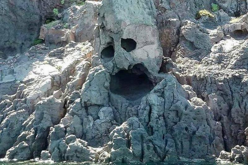 rock looks like sad man