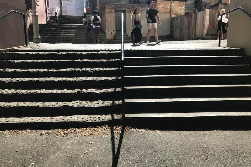 worn down staircase next to new one