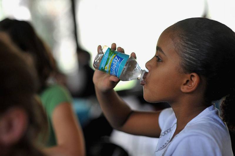 Zephyrhills 159184335 a student drinking Zephyrhills water