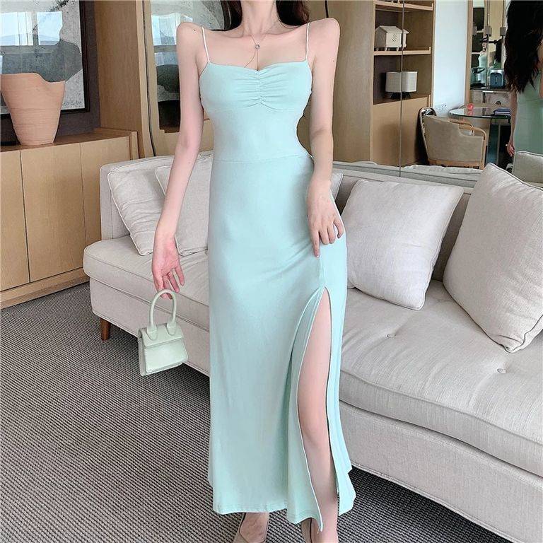super pointy shoulders on model in dress photo