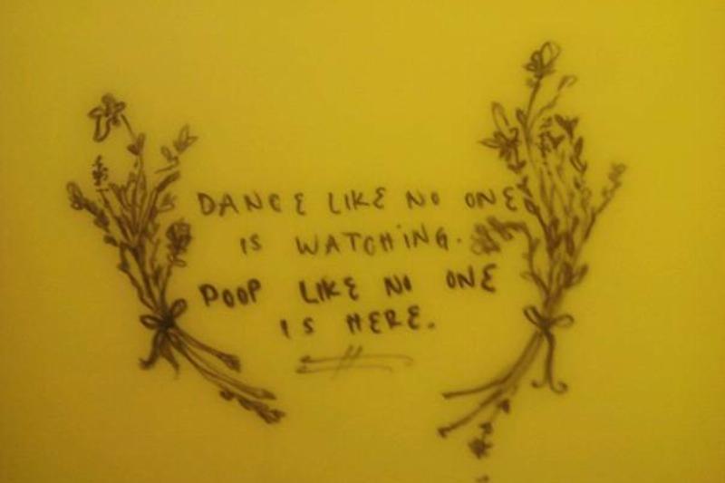 Public bathroom graffiti: Dance like no one is watching. Poop like no one is here