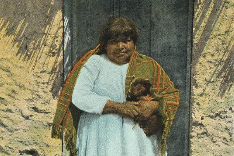 woman A Native American woman wears a long dress, 1913.