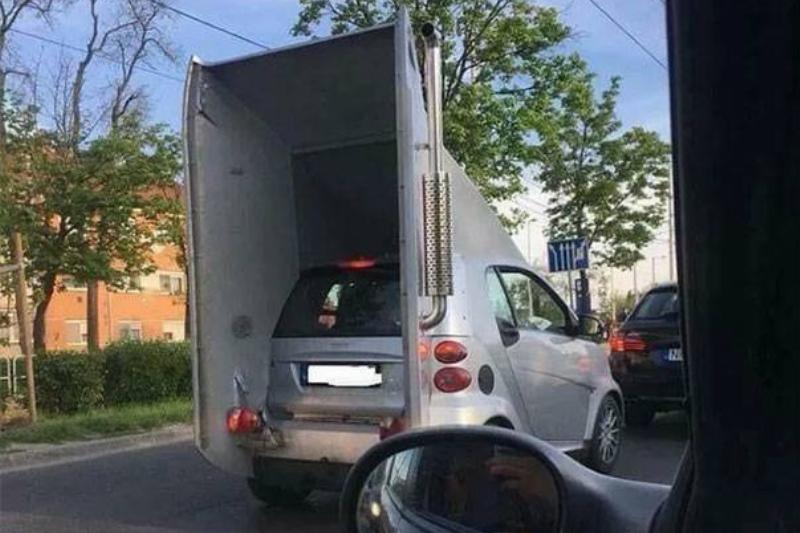 Smart Car with the cab of a truck on it