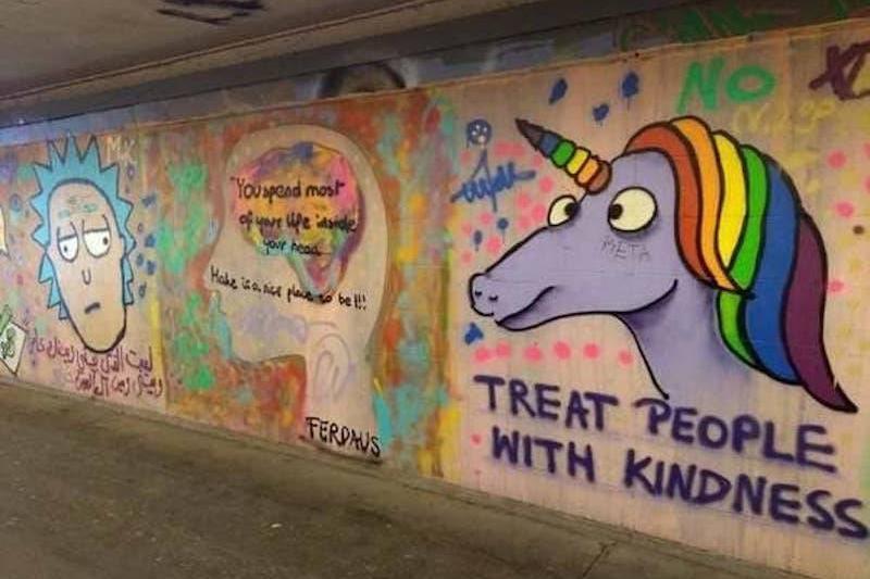 unicorn graffiti that says 