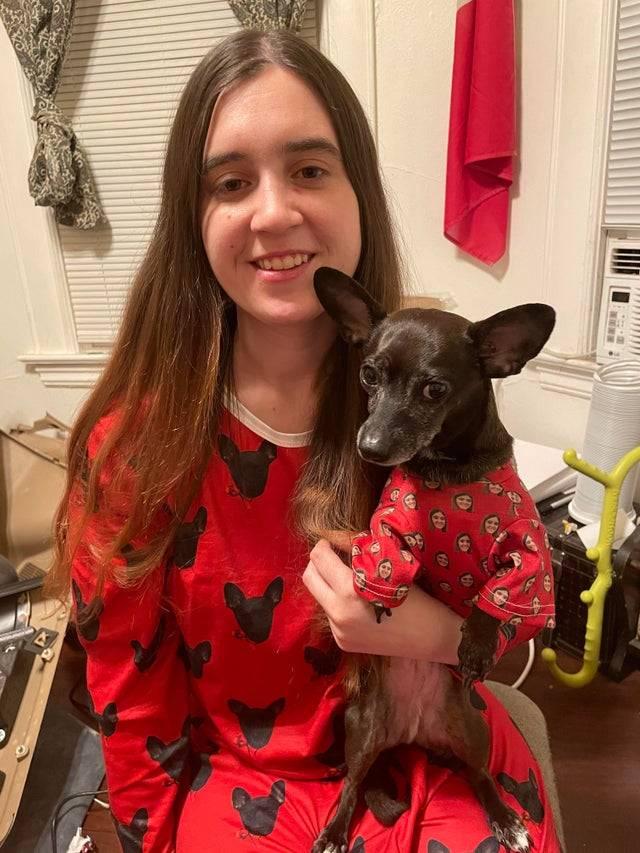 Woman receives matching pyjamas for her and her dog for Christmas. 