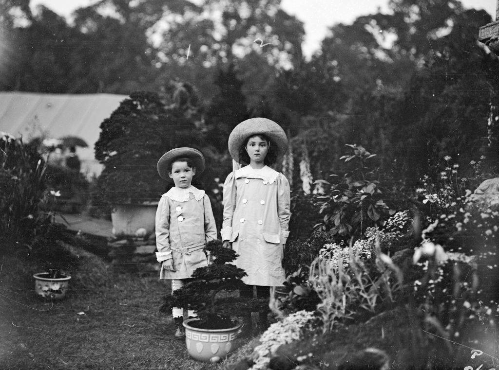 Two little girls dressed in Edwardian daywear
