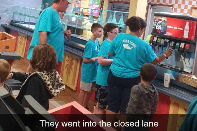 Cutting In Line Family wearing the same color shirt in a restaurant