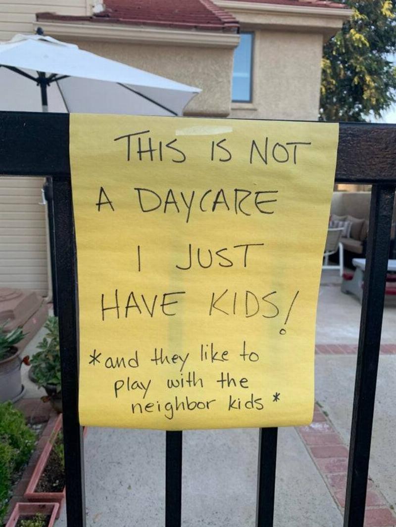 Not A Daycare Sign on fence saying it is not a daycare.