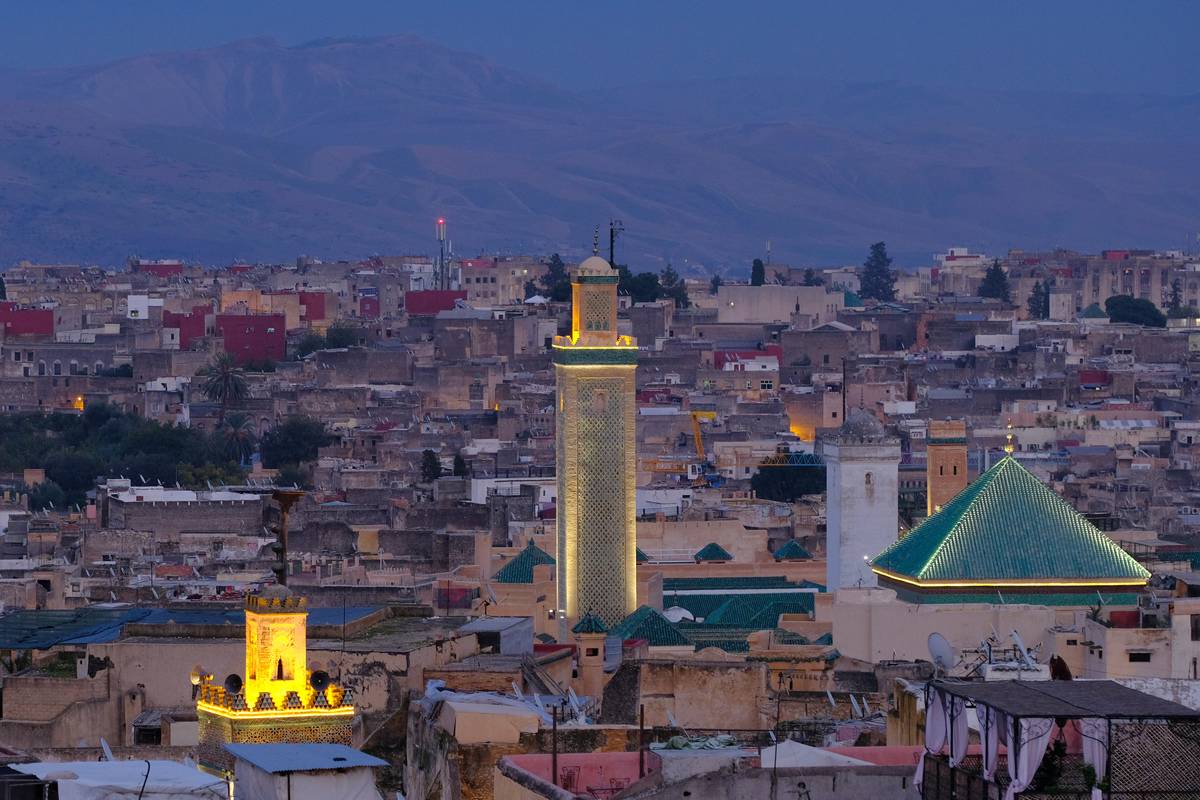 Fez, Morocco: The buildings of the University of al-Qarawiyyin, also written as Al-Karaouine or Al Quaraouiyine, are illuminated at dusk 