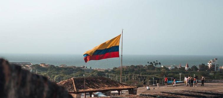 Colombian flag flying over city