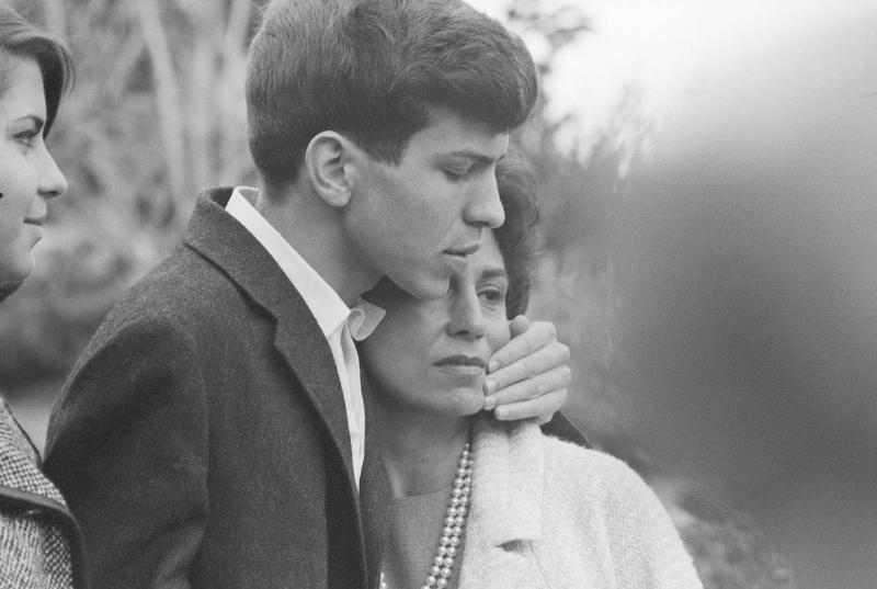 Mrs. Nancy Sinatra embraces her son, Frank Sinatra, Jr. after being released by kidnappers for $240,000 ransom. Three kidnappers were caught and sent to jail.