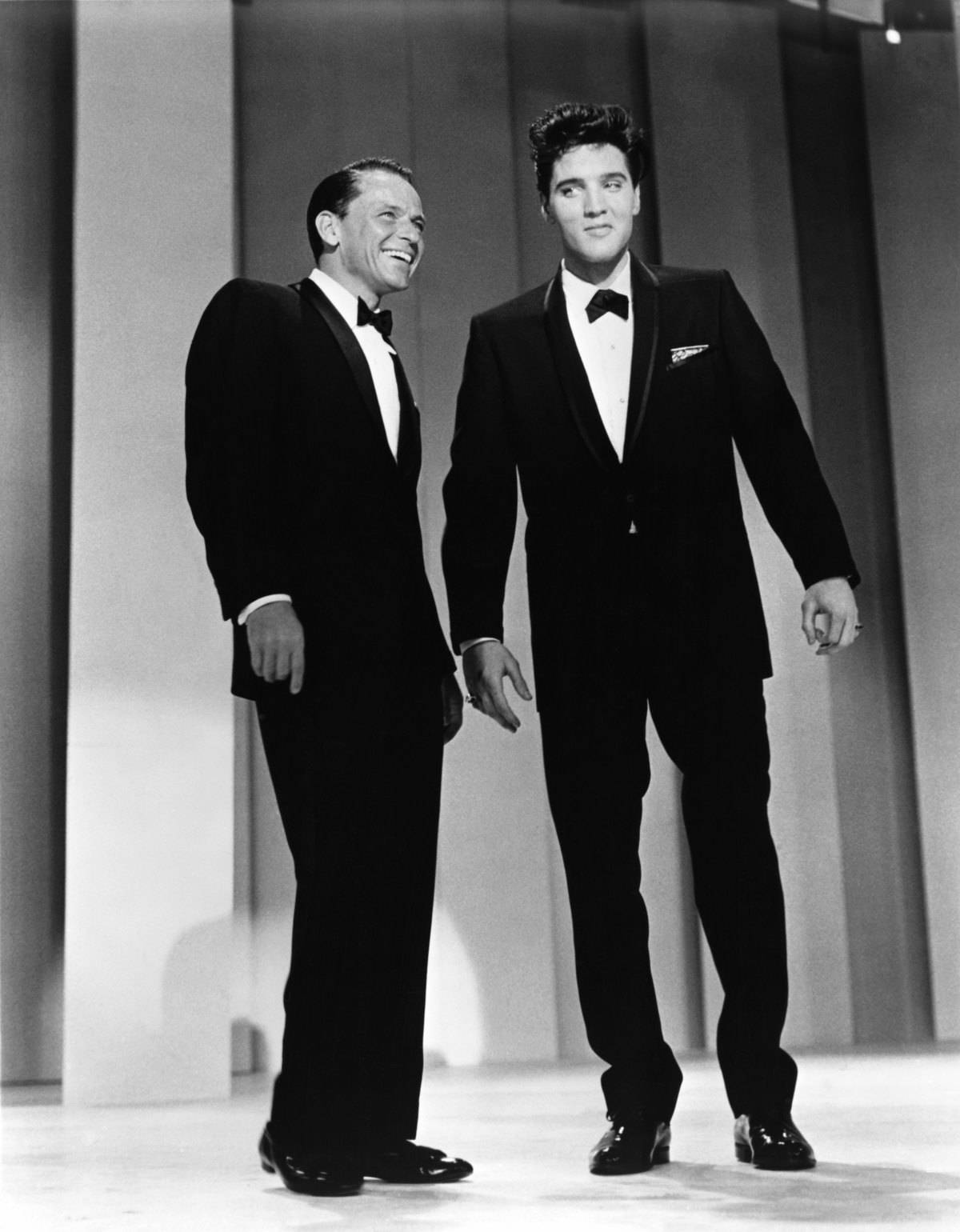 Crooner Frank Sinatra welcomes back Rock and Roll star Elvis Presley after his stint in the US army on his self titled TV variety show on March 26, 1960 (the show aired May 12, 1960) in Los Angeles, California.