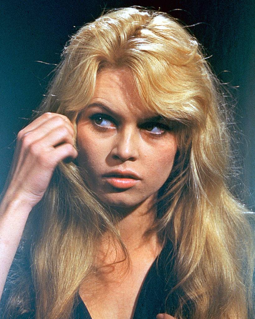 bardot fixing her hair