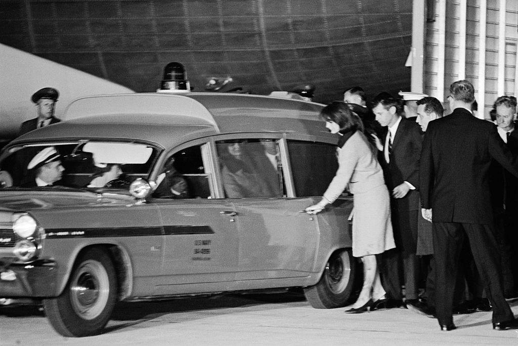 kennedy and hill in front of an ambulance