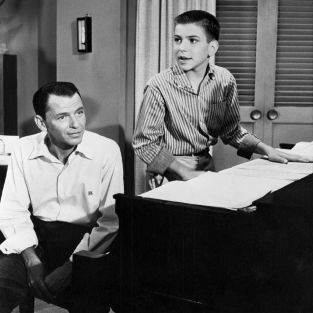 Frank Sinatra (left) and his son Frank Sinatra Jr. (right) in 1958, rehearsing for the Frank Sinatra Show, circa 1958.