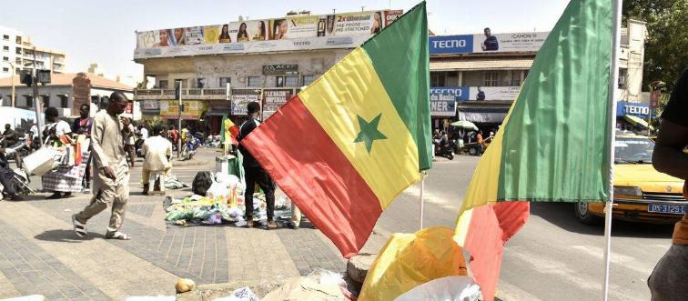 Senegal flags are displayed for sale in the streets of Dakar