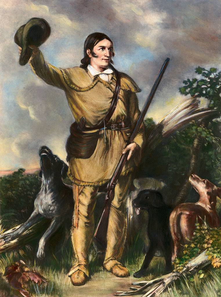 davy crockett with his rifle and hat