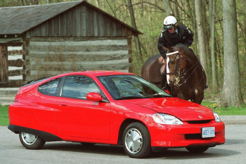 P.C. Vicki Montgomery and her horse Toby Check out the interior of the new Honda Insight.also exteri P.C. Vicki Montgomery and her horse Toby Check out the interior of the new Honda Insight.also exteri
