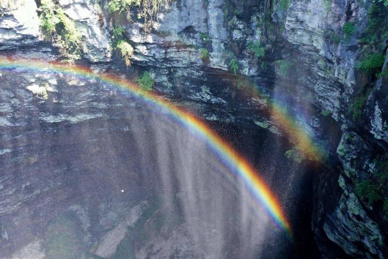 Rainbow Appears At Karst Sinkhole In Xuan'en County