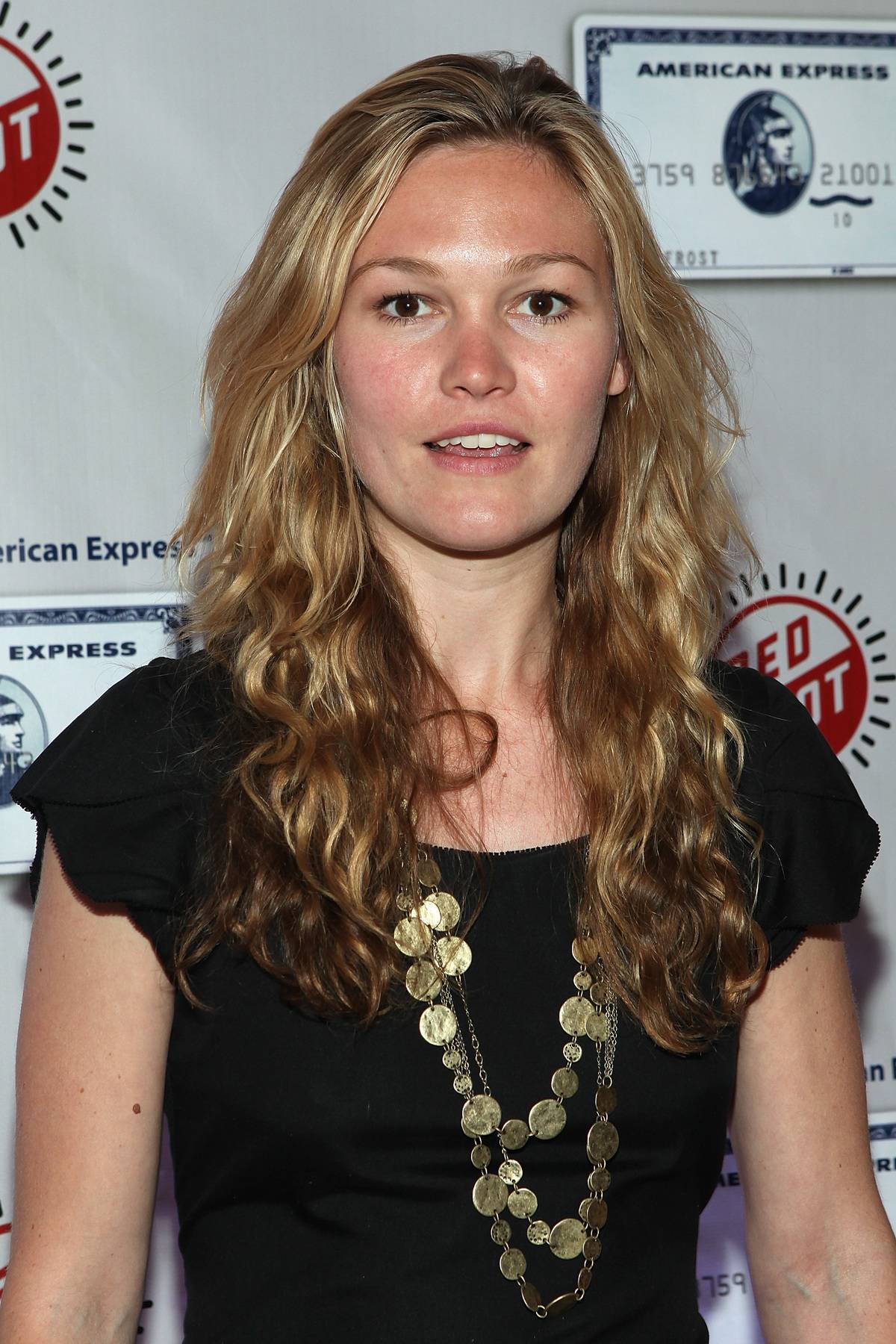 Julia Stiles poses for photographers at ZYNC from American Express Presents The National to Benefit Red Hot - Party