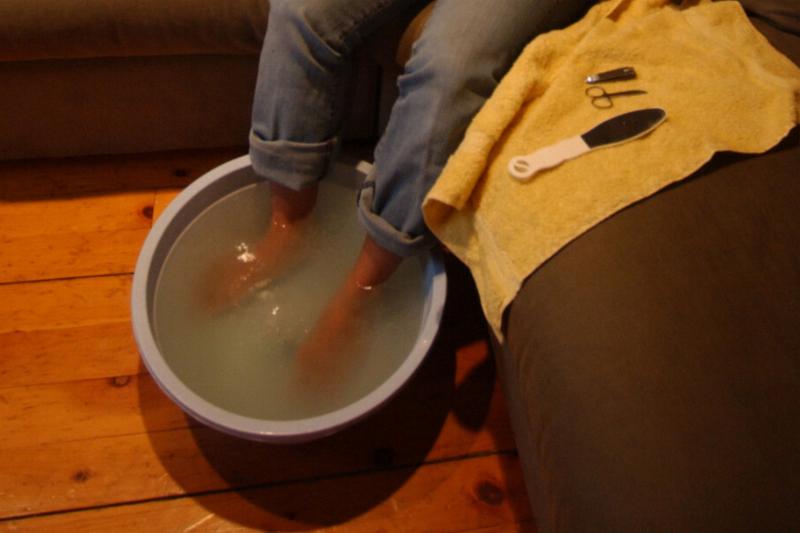 Person's feet in bath soak 